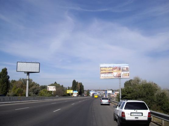 Фото рекламной плоскости по адресу Киевская трасса - мост, из города Фото рекламной плоскости по адресу Киевская трасса - мост, из города