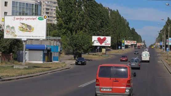 Фото рекламной плоскости по адресу Шухевича ул / Мельника ул, из центра Фото рекламной плоскости по адресу Шухевича ул / Мельника ул, из центра