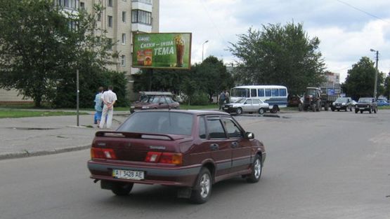 Фото рекламной плоскости по адресу Привокзальная ул., 22 (напротив центрального ж/д вокзала, возле стоянки таксобусов)