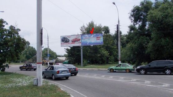 Фото рекламной плоскости по адресу Паровозная ул, на пл 200 лет Херсона, правый