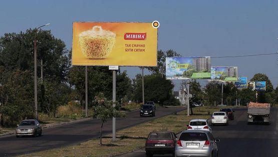 Фото рекламної площини за адресою Карпенка-Карого ул., разделитель, насосн станция, в центр