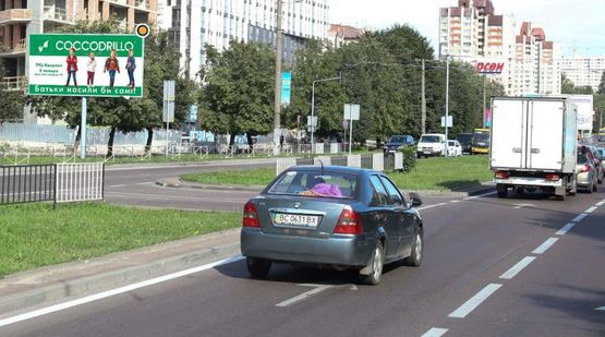 Фото рекламной плоскости по адресу Черновола В. пр., въезд на продрынок, размер нестандартный 2,90 на 5,90