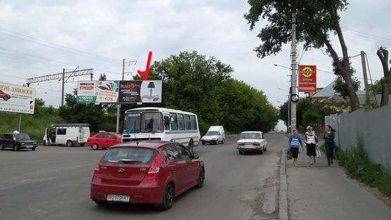 Фото рекламной плоскости по адресу Бродивская ул., возле 2-го транспортного туннеля правый, из центра