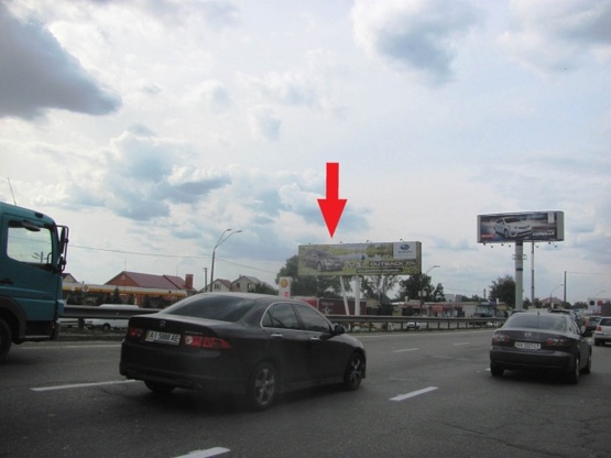 Фото рекламной плоскости по адресу Кольцевая дорога (разделитель, в направлении Победы просп.) напротив ул.Зодчих, 32