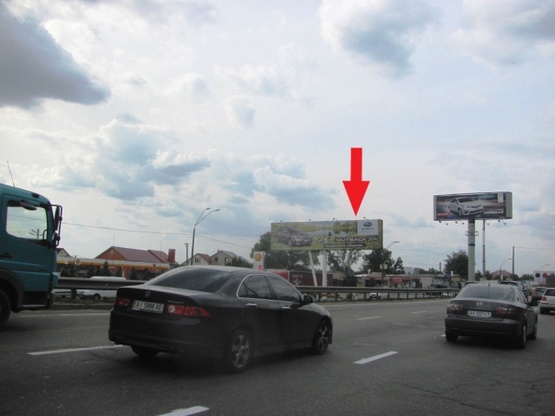 Фото рекламной плоскости по адресу Кольцевая дорога (разделитель, в направлении Победы просп.) напротив ул.Зодчих, 32