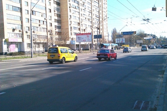 Фото рекламной плоскости по адресу Довженко ул., 14 (магазин "Энран Акрос, клуб "Ника", в направлении просп. Победы)