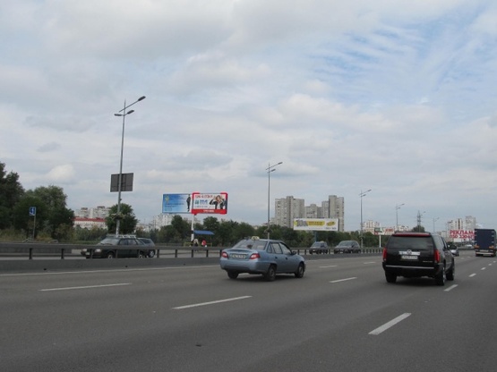Фото рекламної площини за адресою Бажана Н. просп., 600м до ст. м.  "Харьковская" (ТЦ "Пирамида, АЗС "Золотой гепард", направление в Борисполь)
