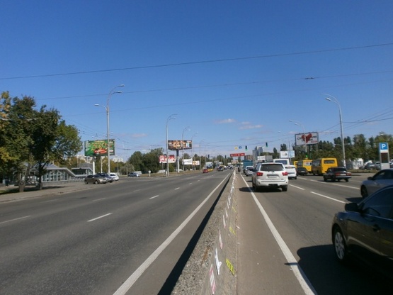 Фото рекламної площини за адресою Проспект Глушкова ст. М "Ипподром"(Выезд с ул. В. Касьяна на проспект Глушкова, направление на пл. Московскую)