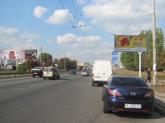 Фото рекламной плоскости по адресу Зодчих ул.,62, Кольцевая дорога (Ашан, АТБ, Новая Почта, Автоцентр, Эльдорадо) Фото рекламной плоскости по адресу Зодчих ул.,62, Кольцевая дорога (Ашан, АТБ, Новая Почта, Автоцентр, Эльдорадо)