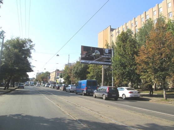 Фото рекламной плоскости по адресу Конарева ул. 15 (Красноармейская ул.),  (Тех.училище №41, Южный Автоцентр, ресторан "Китайской кухни", СТО, вычислительный центр ЮЖД), в направл. ул. Полтавский шлях