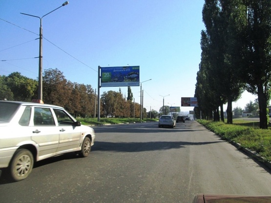 Фото рекламной плоскости по адресу Павлова Ак.ул. - Бестужева ул., (Декор Система, шиномонтаж, парк Памяти, Электронмаш), в направлении к  ТК"Барабашово", Окружной дороги