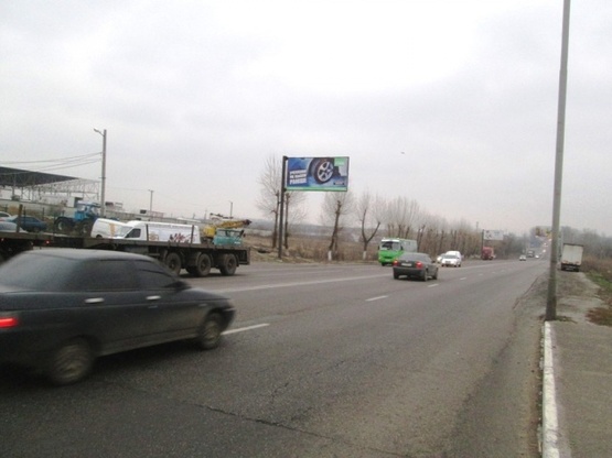 Фото рекламной плоскости по адресу Гагарина просп., напротив №352, (гипермаркет "Эпицентр", "Безлюдовский мясокомбинат", АЗС "БРОМ"), выезд из города, из аэропорта