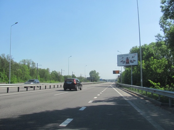 Фото рекламной плоскости по адресу Новообуховская трасса (Днепропетровское шоссе), в направлении из г.Киева, за 3км. перед ТЦ"Мегамаркет", 350м после поворота на с. Лесники, 4км+800метров Фото рекламной плоскости по адресу Новообуховская трасса (Днепропетровское шоссе), в направлении из г.Киева, за 3км. перед ТЦ"Мегамаркет", 350м после поворота на с. Лесники, 4км+800метров