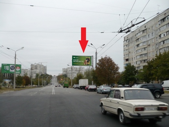 Фото рекламної площини за адресою ул. Гвардейцев Широненцов, 121 ( маркет ПОСАД, СМ АТБ  Вива Пицца),  направление к ул.Дружбы  Народов Фото рекламної площини за адресою ул. Гвардейцев Широненцов, 121 ( маркет ПОСАД, СМ АТБ  Вива Пицца),  направление к ул.Дружбы  Народов