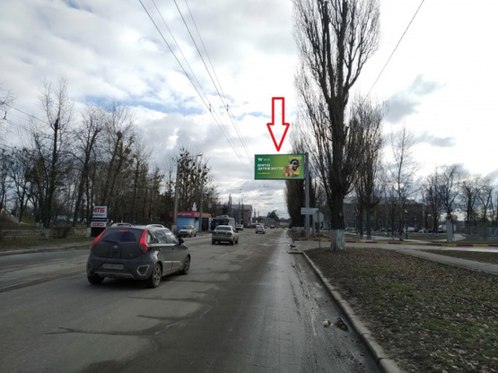 Фото рекламной плоскости по адресу ул.Дубинской-просп.Любови Малой (СТО, ресторан "Арчи", салон красоты), направл. к ул.Полтавский шлях