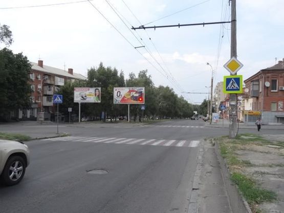 Фото рекламної площини за адресою Поля пр. - Ульянова ул., в центр Фото рекламної площини за адресою Поля пр. - Ульянова ул., в центр