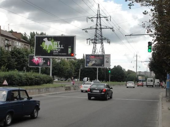 Фото рекламной плоскости по адресу Поля пр. - Стромцова ул., из центра