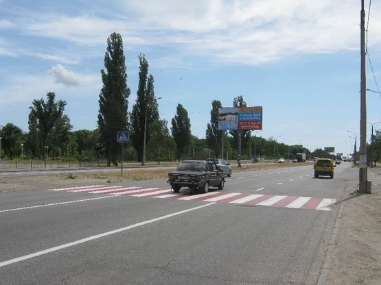 Фото рекламної площини за адресою Набережна магістраль  – каскад «Радуга», напр. руху до вокзалу (призматрон) Фото рекламної площини за адресою Набережна магістраль  – каскад «Радуга», напр. руху до вокзалу (призматрон)