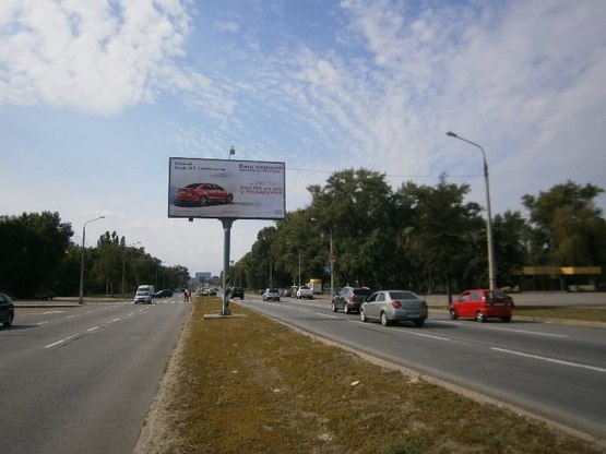 Фото рекламной плоскости по адресу Набережна магістраль  – каскад «Радуга», напр. руху до порту(призматрон) Фото рекламной плоскости по адресу Набережна магістраль  – каскад «Радуга», напр. руху до порту(призматрон)