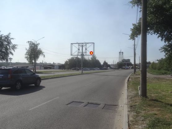 Фото рекламной плоскости по адресу Набережна магістраль  – пішохідний міст(призматрон), напрямок руху до порту Фото рекламной плоскости по адресу Набережна магістраль  – пішохідний міст(призматрон), напрямок руху до порту