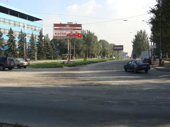 Фото рекламной плоскости по адресу Південне шосе (розподільча смуга) - пр.Металургів (напрямок руху до вул.Дігональної) (призматрон) Фото рекламной плоскости по адресу Південне шосе (розподільча смуга) - пр.Металургів (напрямок руху до вул.Дігональної) (призматрон)