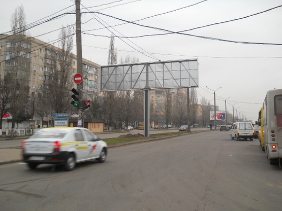 Фото рекламної площини за адресою Днепропетровская дорога №70 левая В3