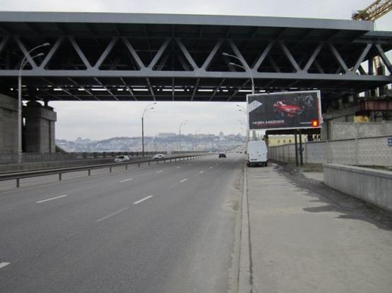 Фото рекламної площини за адресою Набережнo-Рыбальская ул. - Пoдoльскo-Вoскресенский мoст к Пoдoлу