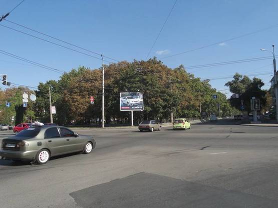 Фото рекламної площини за адресою просп. Мира х ул. Щорса призма 3х4 (грань 1)