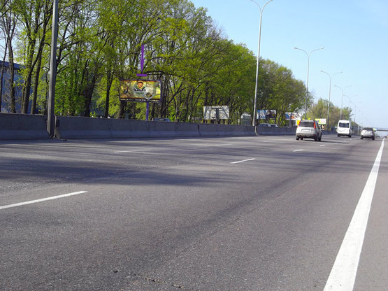 Фото рекламной плоскости по адресу Одесская трасса, 1000 м до Новой Линии, направление на Одессу