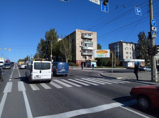 Фото рекламной плоскости по адресу просп. Свободы (ул.60л.Октября), перекр. с ул. Европейской (Щорса), 64, р-н "Водоканал"