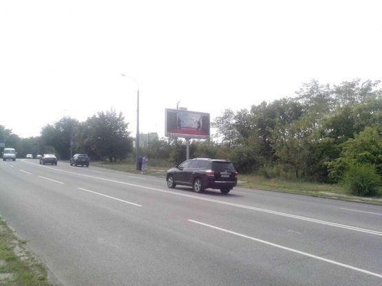 Фото рекламної площини за адресою вул.Космічна Фото рекламної площини за адресою вул.Космічна