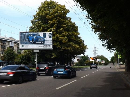 Фото рекламної площини за адресою пр.О.Поля (Автодорожний технікум), маг.Юність/пр.Кирова (Автодорожный техникум) маг.Юность центр города, супермаркеты