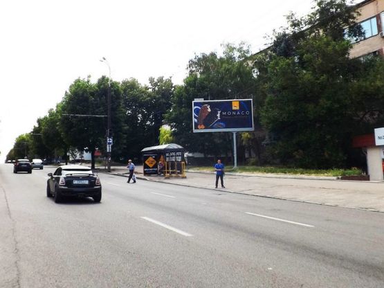 Фото рекламной плоскости по адресу пр.О.Поля,46/пр.Кирова, 46 движение к ул.Титова, к ТЦ Славутич, к ТЦ Апполо Фото рекламной плоскости по адресу пр.О.Поля,46/пр.Кирова, 46 движение к ул.Титова, к ТЦ Славутич, к ТЦ Апполо