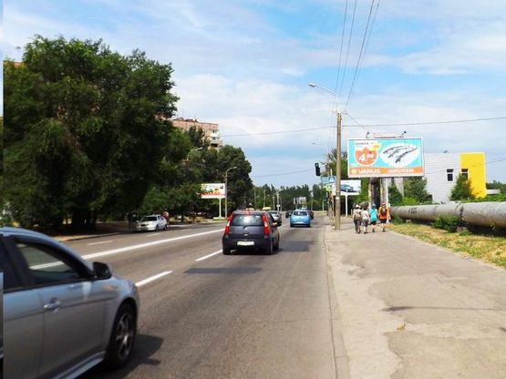 Фото рекламної площини за адресою вул.Космічна, р-н "Billa"/ул.Космическая, р-н "Билла", кольцо, выезд на Набережную, супермаркеты, торговые центры, аватосалон, большой поток движения