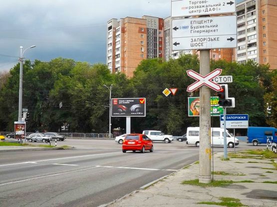 Фото рекламной плоскости по адресу Запорізьке шосе - вул. Космічна, бек-лайт 8х4 /Запорожское шоссе - ул. Космическая, бэк-лайт 8х4