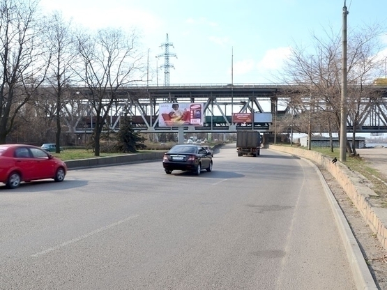 Фото рекламної площини за адресою вул. Січеславська Набережна, Амурський міст, район річкового вокзалу, з центру (Беклайт 4х8)/ул. Набережная Ленина, Амурский мост, район речного вокзала, из центра (бэклайт 4х8)