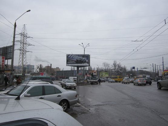 Фото рекламної площини за адресою просп. Маршала Жукова - ул. 25-й Чапаевской дивизии (призма на треугольнике)