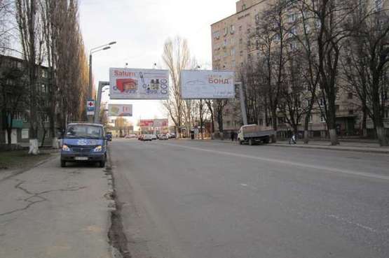 Фото рекламної площини за адресою ул. Краснова, 14 - пл. Толбухина (из города правый Призма) Фото рекламної площини за адресою ул. Краснова, 14 - пл. Толбухина (из города правый Призма)