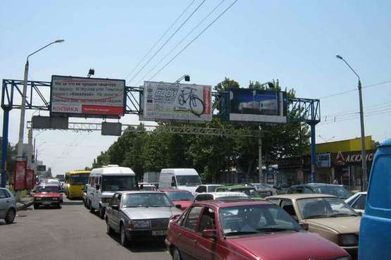 Фото рекламной плоскости по адресу пр-т М.Жукова (напротив авторынка "Успех") (из города центральный Призма)