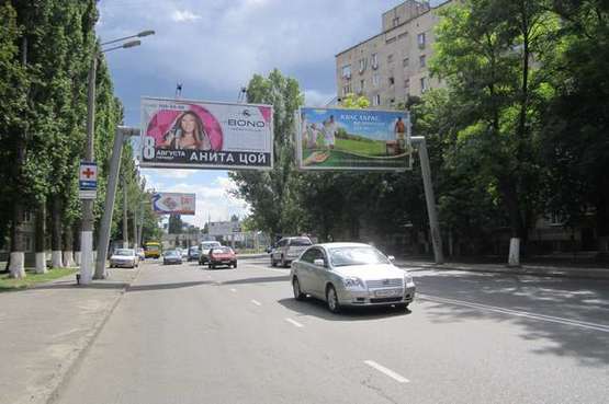 Фото рекламной плоскости по адресу ул. Краснова, 14 - пл. Толбухина (из города левый Призма)