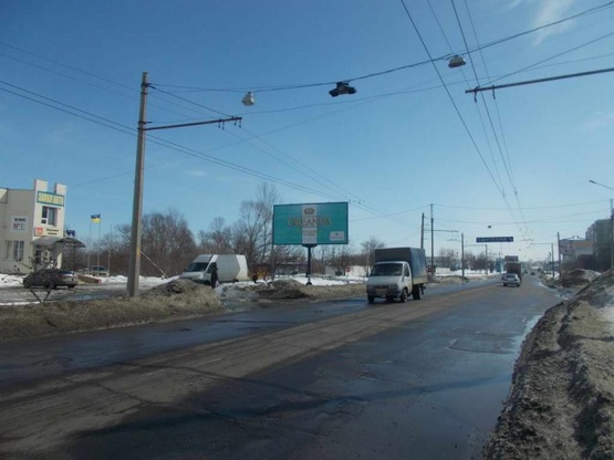 Фото рекламной плоскости по адресу Героев Крут ул. (Черепина ул), 36, (мебел.салон "Статус", "Эко-Маркет", АЗС "ANP", салон "Ssang Yong","Chery"), в направл. ул. Замостянской