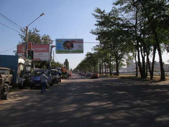 Фото рекламной плоскости по адресу ул. Академика Вильямса, 82 (возле Метро) (призма) Фото рекламной плоскости по адресу ул. Академика Вильямса, 82 (возле Метро) (призма)