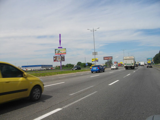 Фото рекламной плоскости по адресу Кольцевая дорога, Жулянский путепровод, направл. на Святошин (верхняя пл.)