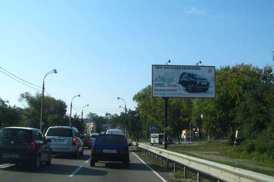 Фото рекламной плоскости по адресу Шевченка Тараса пл., : Мінське шосе; навпроти автостоянки "Полісся" (в напр. пл.Шевченко)