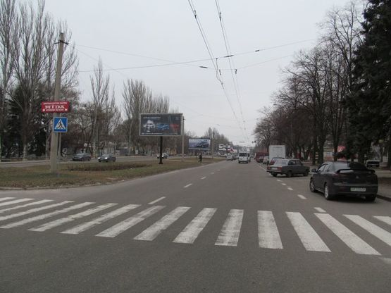 Фото рекламної площини за адресою Космическая-Восточная (из города)