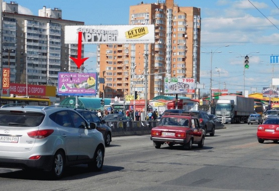Фото рекламной плоскости по адресу Палладина Академика пр-т перекр ул. Уборевича от пр-т Победы, на раздел. треугольнике