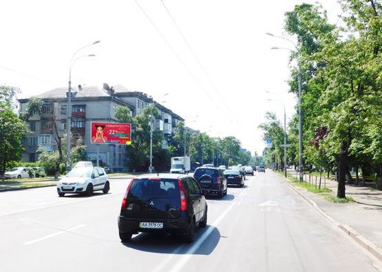 Фото рекламной плоскости по адресу Строителей ул. 30