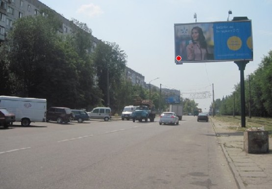 Фото рекламной плоскости по адресу Моторостроителей ул. - Красная ул.