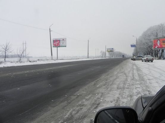 Фото рекламной плоскости по адресу Одесса - Николаев 21+570 Б Фото рекламной плоскости по адресу Одесса - Николаев 21+570 Б