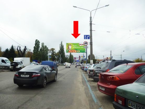 Фото рекламной плоскости по адресу Павлова ул. / Тюринская ул. (бывш. Якира ул.), флажок, со стороны рынка "Барабашова", в центр